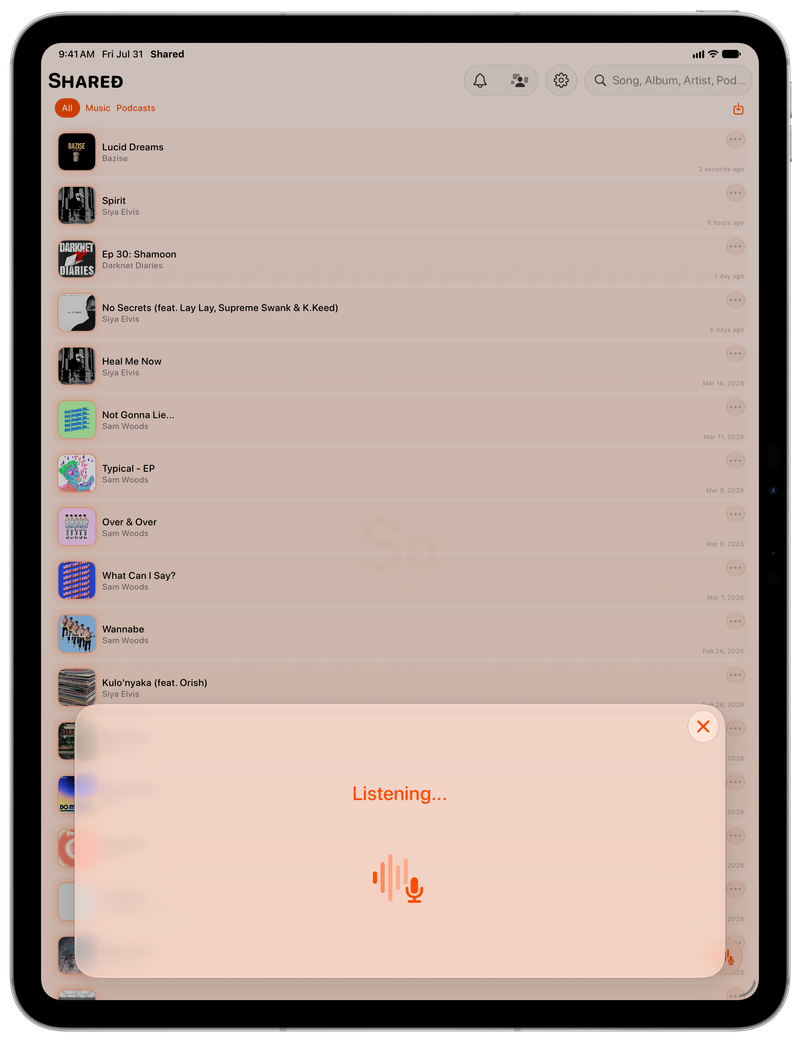 Shared on iPad Pro 13-inch showing Identifying Song in the Orange tint, light appearance.