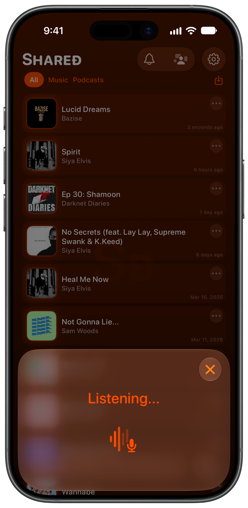 Shared on iPhone 17 showing Identifying Song in the Orange tint, dark appearance.