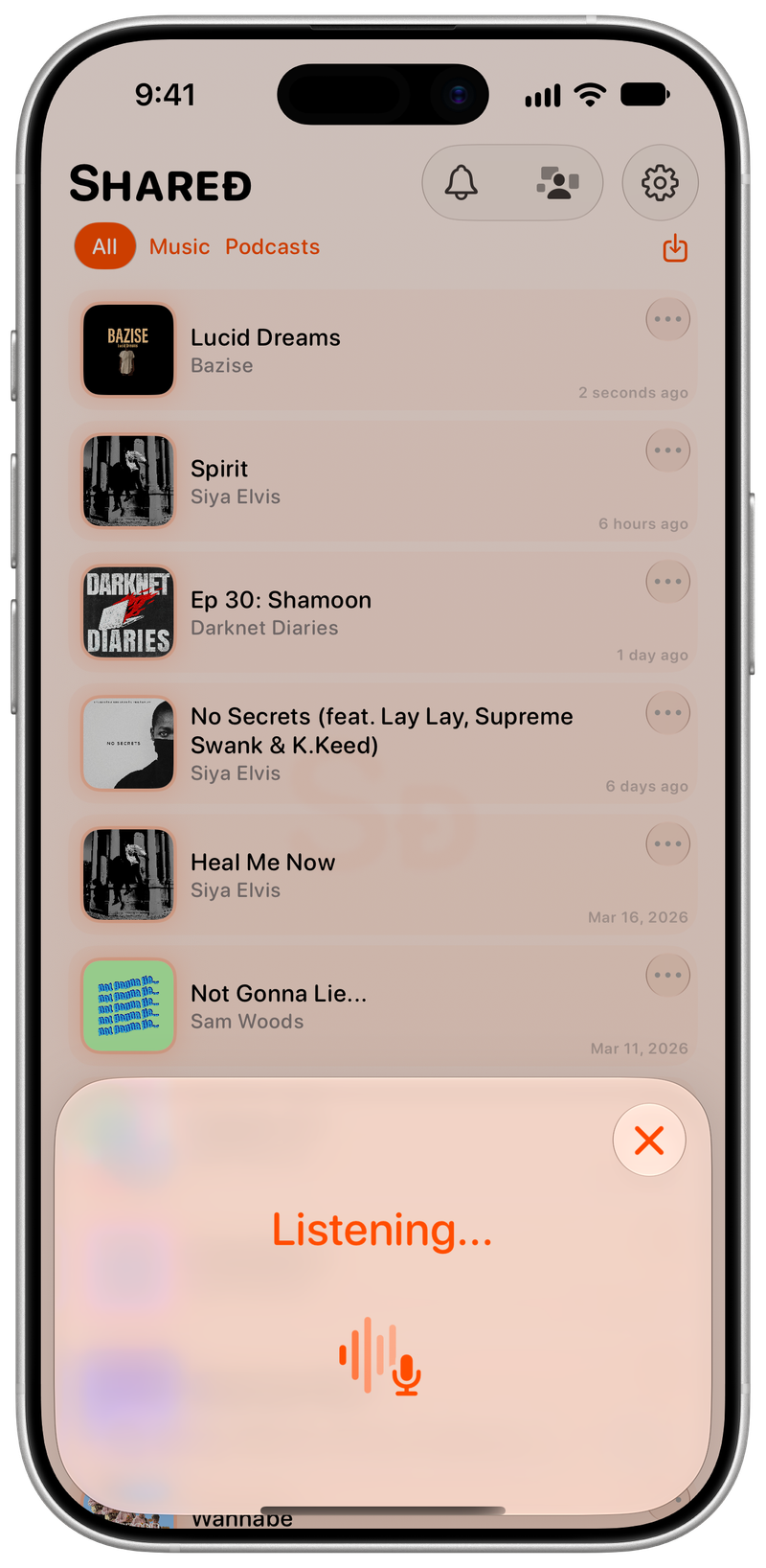 Shared on iPhone 17 showing Identifying Song in the Orange tint, light appearance.