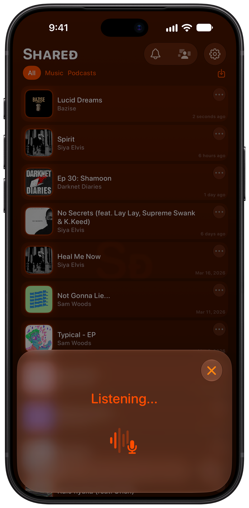 Shared on iPhone 18 Pro Max showing Identifying Song in the Orange tint, dark appearance.