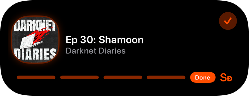 The Shared Live Activity in the expanded Dynamic Island showing Done in the Orange tint, dark appearance.