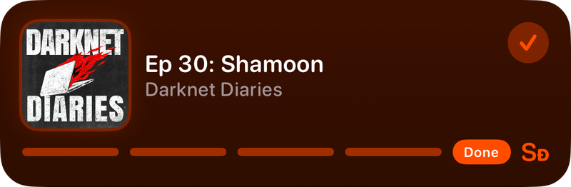 The Shared Live Activity on the Lock Screen showing Done in the Orange tint, dark appearance.