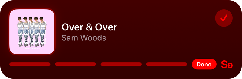 The Shared Live Activity on the Lock Screen showing Done in the Red tint, dark appearance.